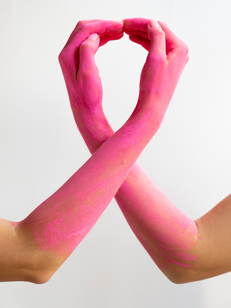 close-up-pink-painted-arms-expressing-awareness - zanfaraz